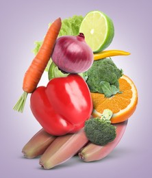 Stack of different vegetables and fruits on pale light violet background