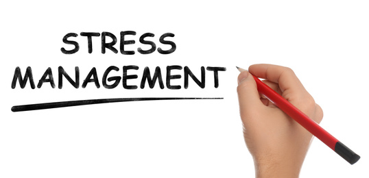 Man writing text STRESS MANAGEMENT on white background, closeup. Banner design