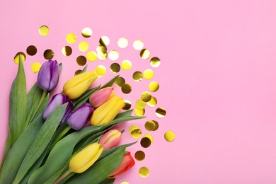 Photo of Beautiful colorful tulips and confetti on pink background, flat lay. Space for text