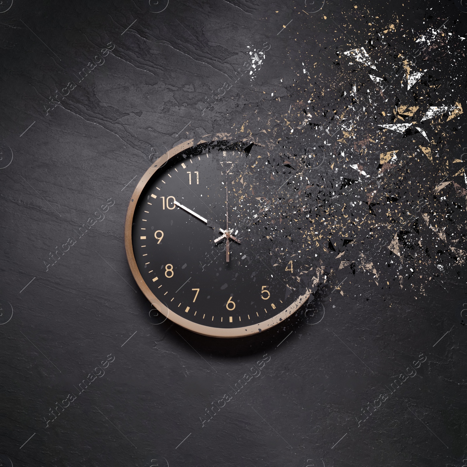 Image of Fleeting time concept. Analog clock dissolving on black background