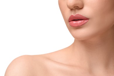 Woman wearing beautiful lip gloss on white background, closeup