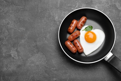 Romantic breakfast on grey table, top view with space for text. Valentine's day celebration