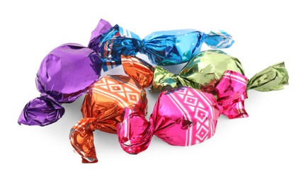 Sweet candies in colorful wrappers on white background