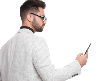 Photo of Young businessman with smartphone on white background