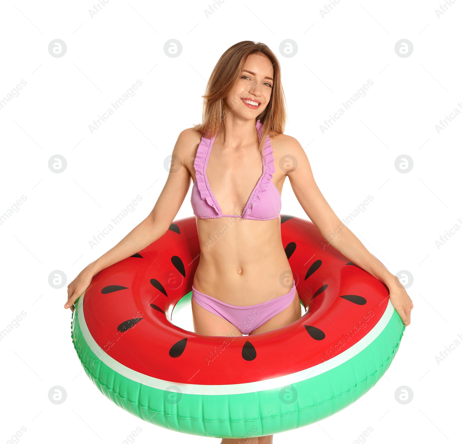 Photo of Beautiful young woman in stylish bikini with watermelon inflatable ring on white background