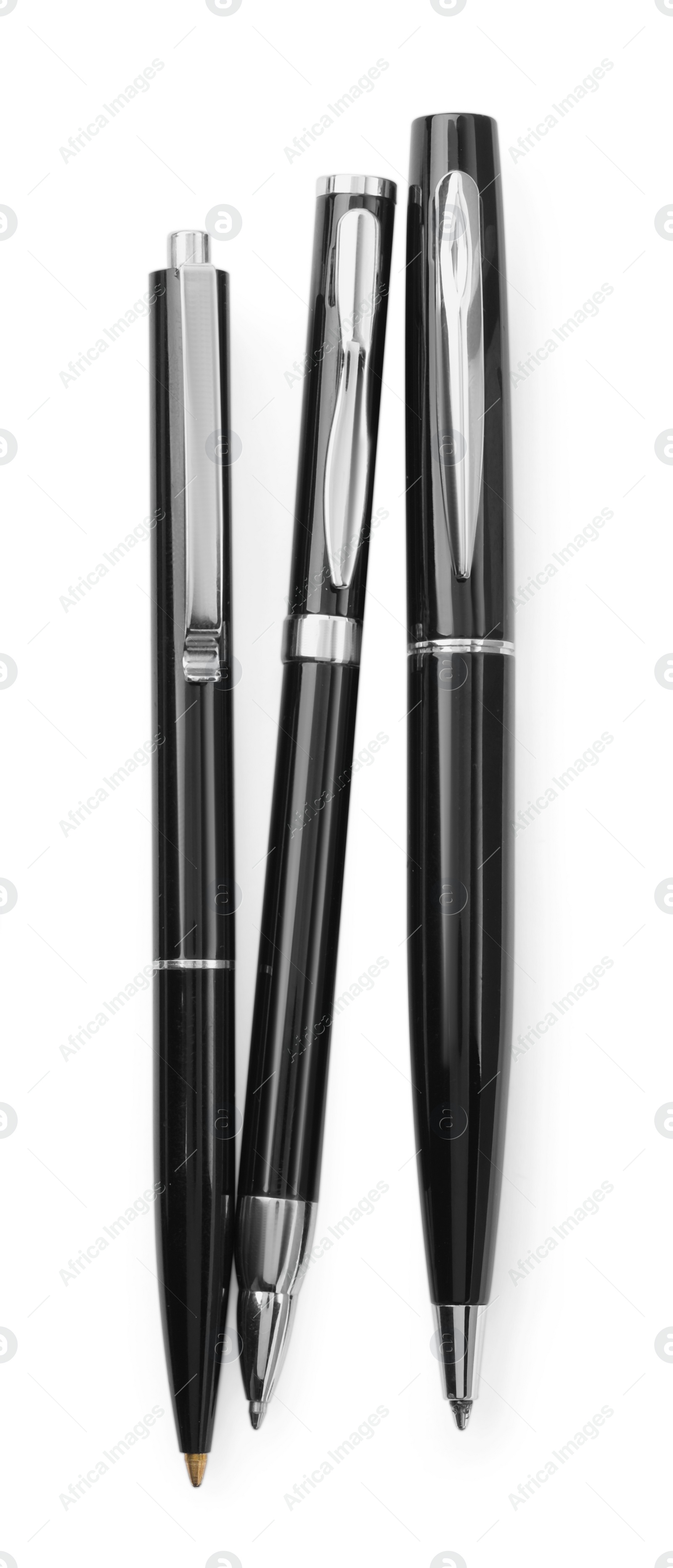 Photo of New stylish black pens isolated on white, top view