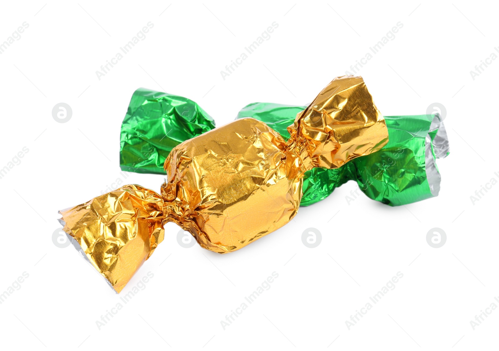 Photo of Tasty candies in colorful wrappers isolated on white