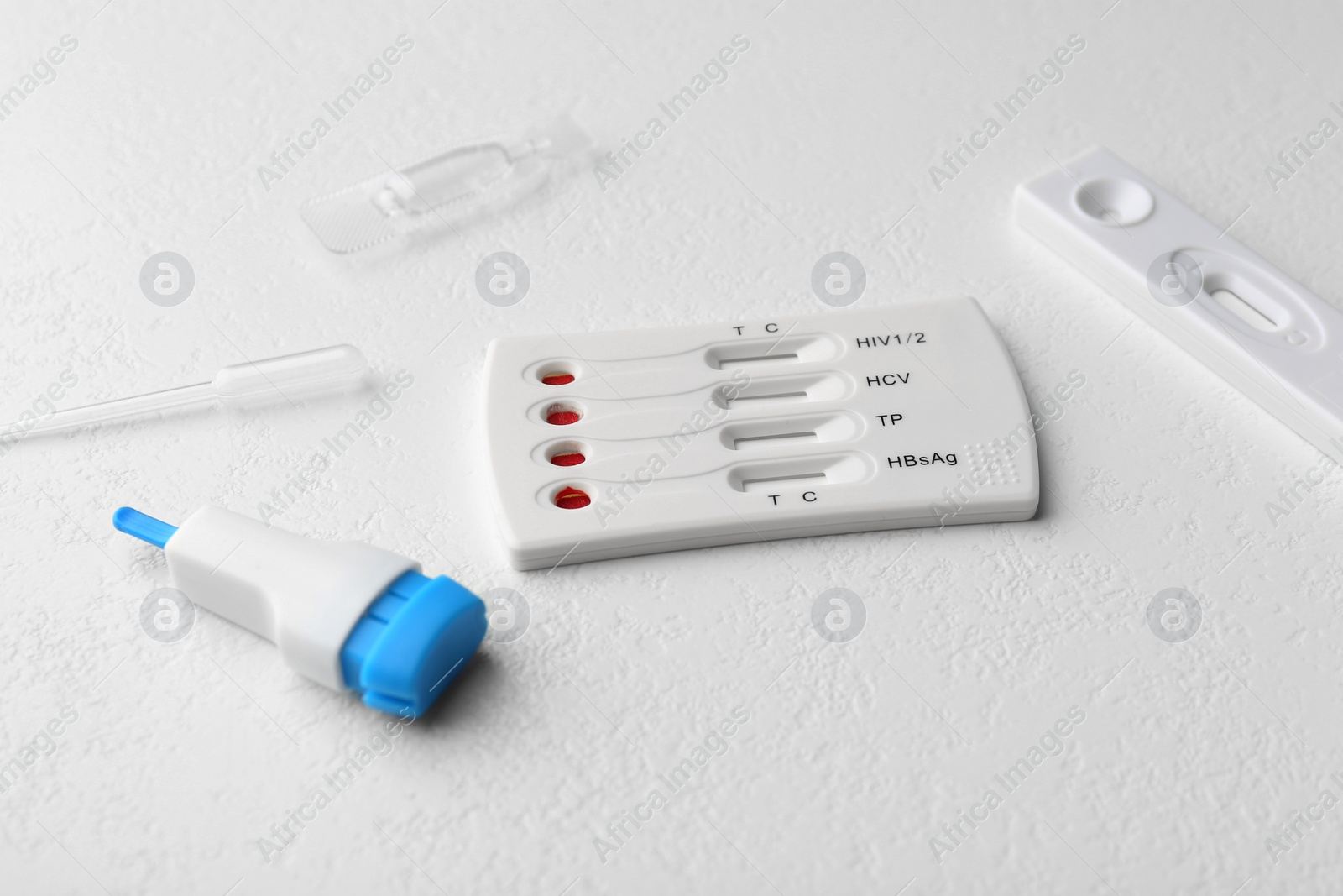 Photo of Disposable express test kit on white table