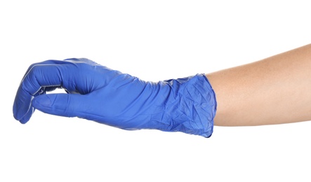 Photo of Woman in blue latex gloves holding something on white background, closeup of hand