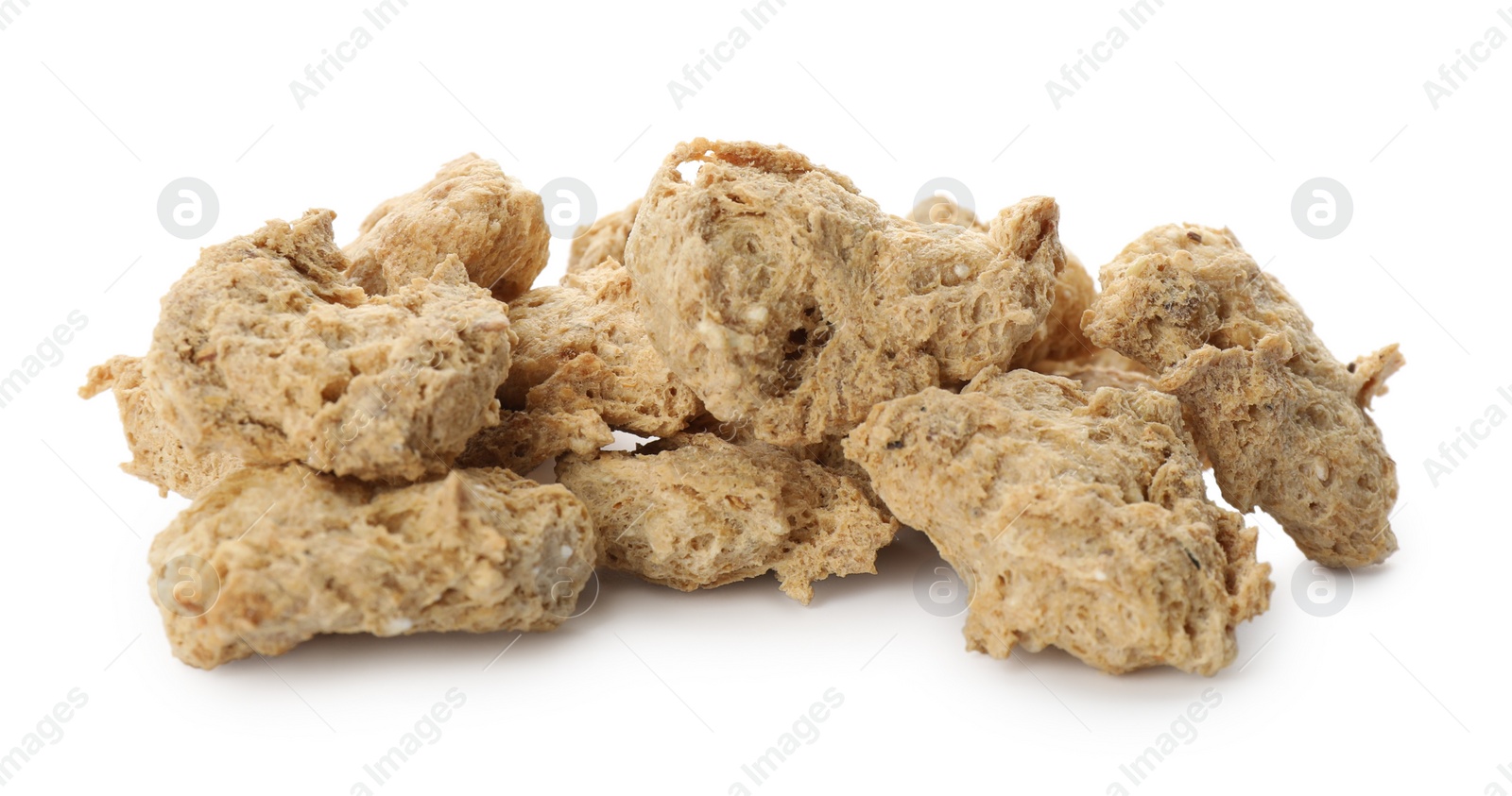 Photo of Dehydrated soy meat chunks on white background