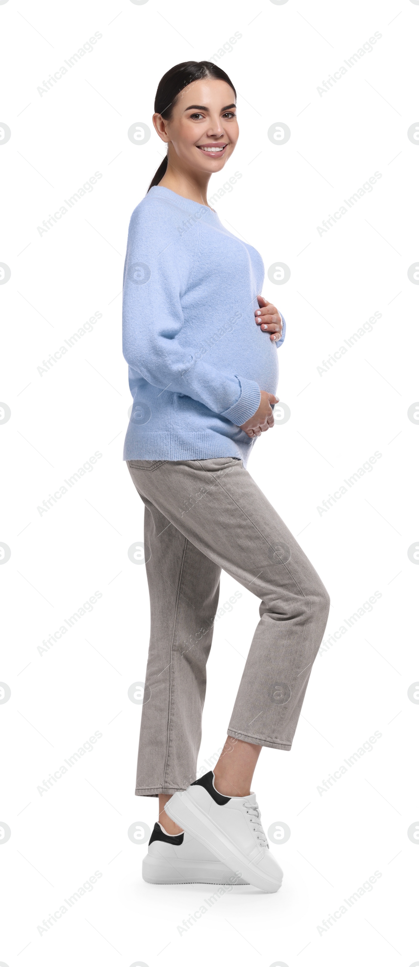 Photo of Beautiful happy pregnant woman isolated on white