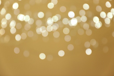 Photo of Blurred view of shiny silver lights. Bokeh effect