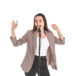 Photo of Young stylish woman singing in microphone on white background