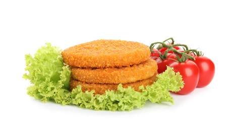 Photo of Delicious fried breaded cutlets with cherry tomatoes and lettuce on white background
