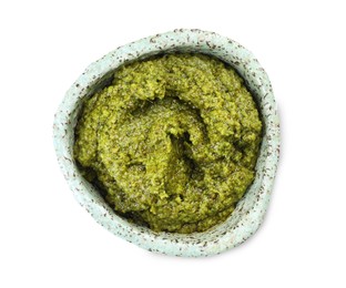 Photo of Fresh tasty pesto sauce isolated on white, top view