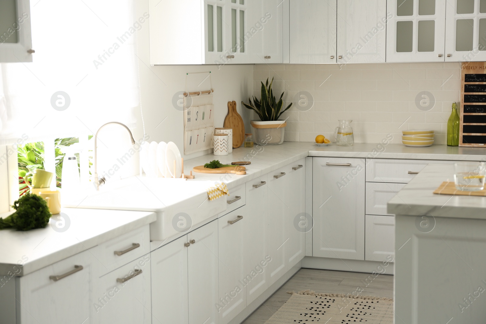 Elegant kitchen interior design with modern furniture Photo of Elegant kitchen interior design with modern furniture