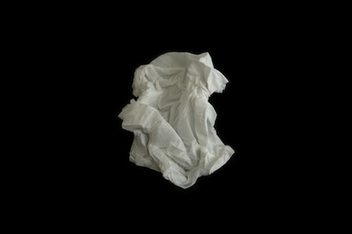 Photo of Used paper tissue on black background, top view