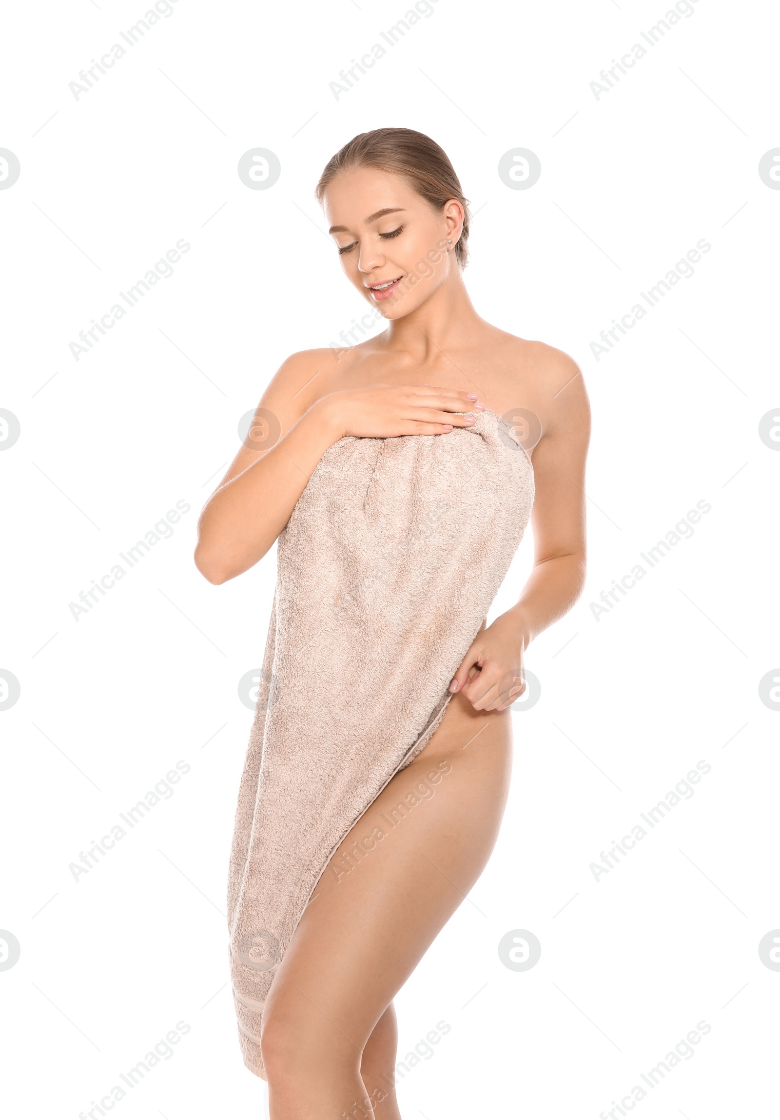 Photo of Portrait of young pretty woman with towel on white background