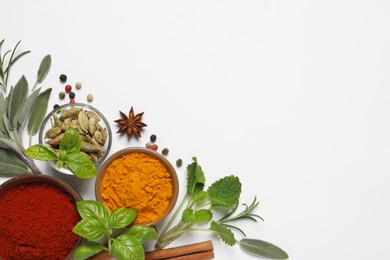 Photo of Different herbs and spices on white background, top view