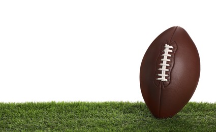 Leather American football ball on lawn against white background