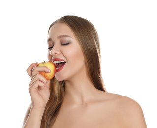 Photo of Young woman with apple on white background. Vitamin rich food