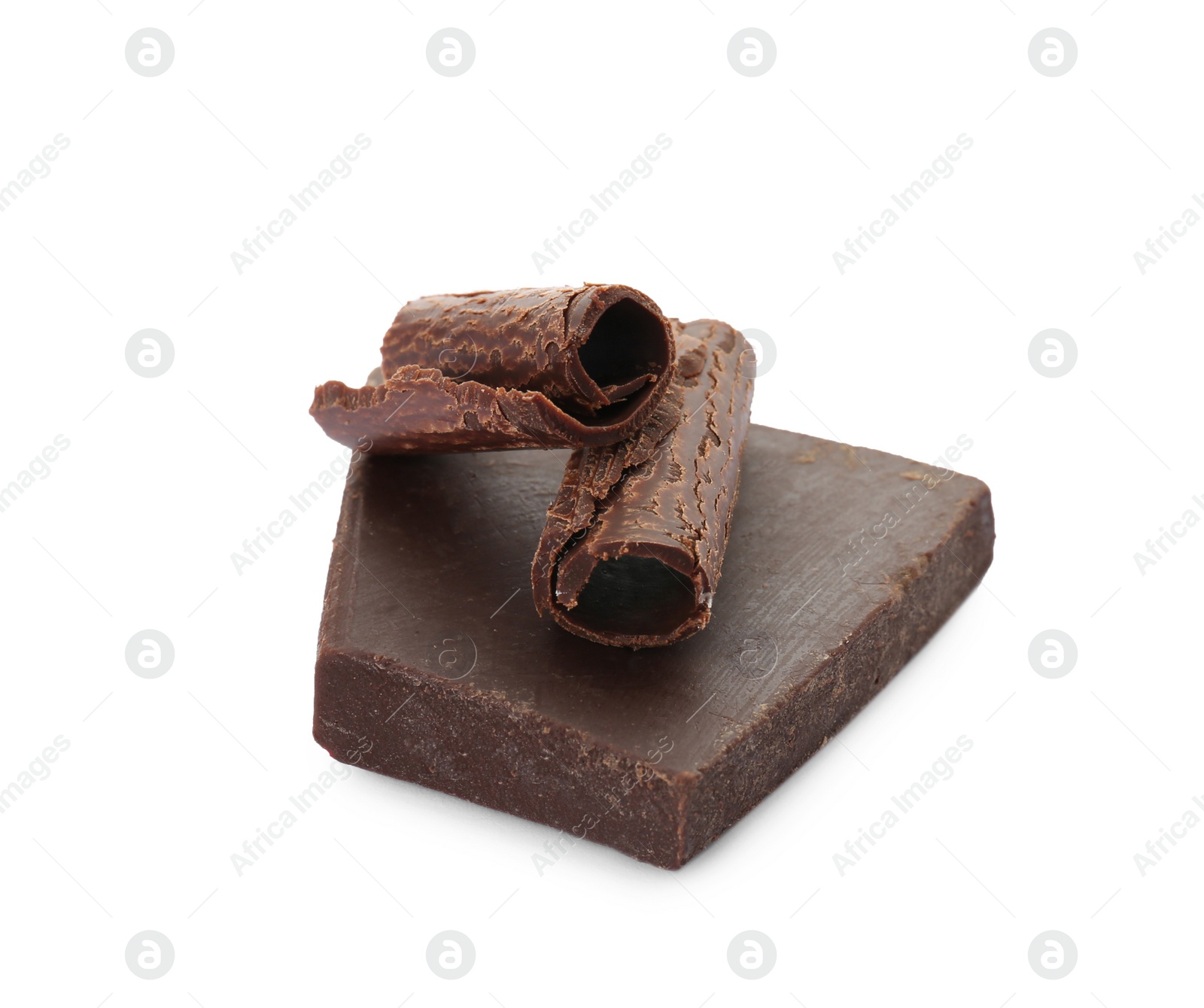 Photo of Delicious black chocolate curls and piece on white background