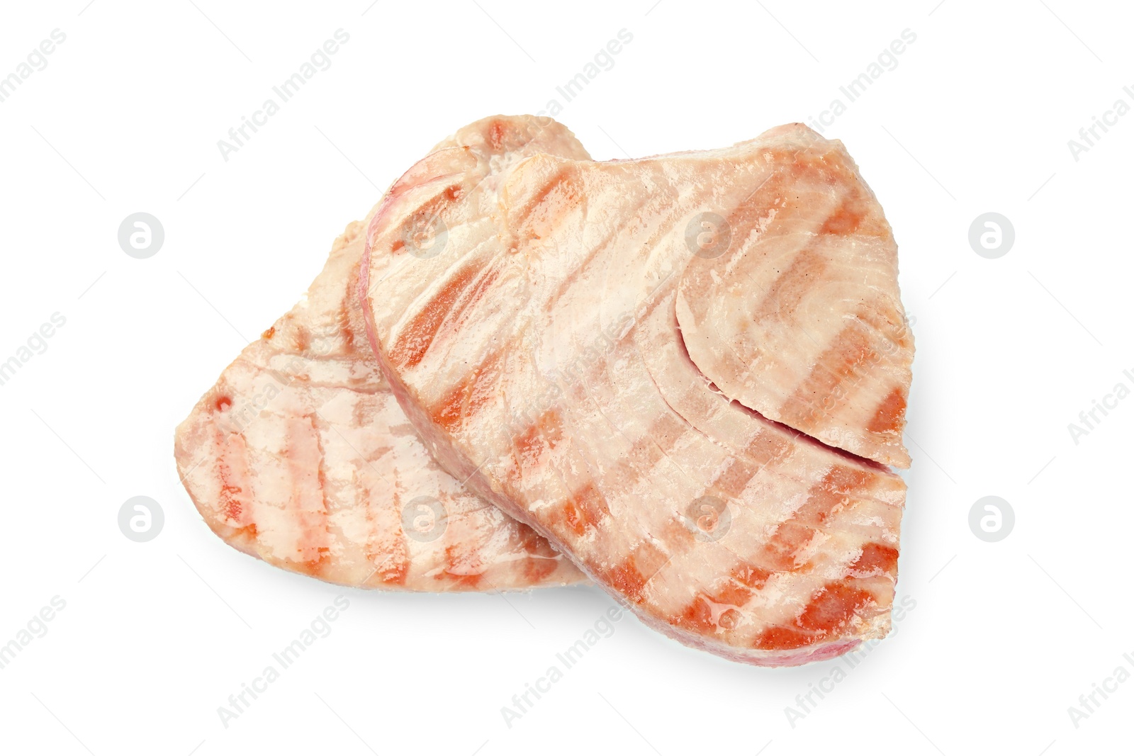 Photo of Delicious grilled tuna steaks isolated on white, top view