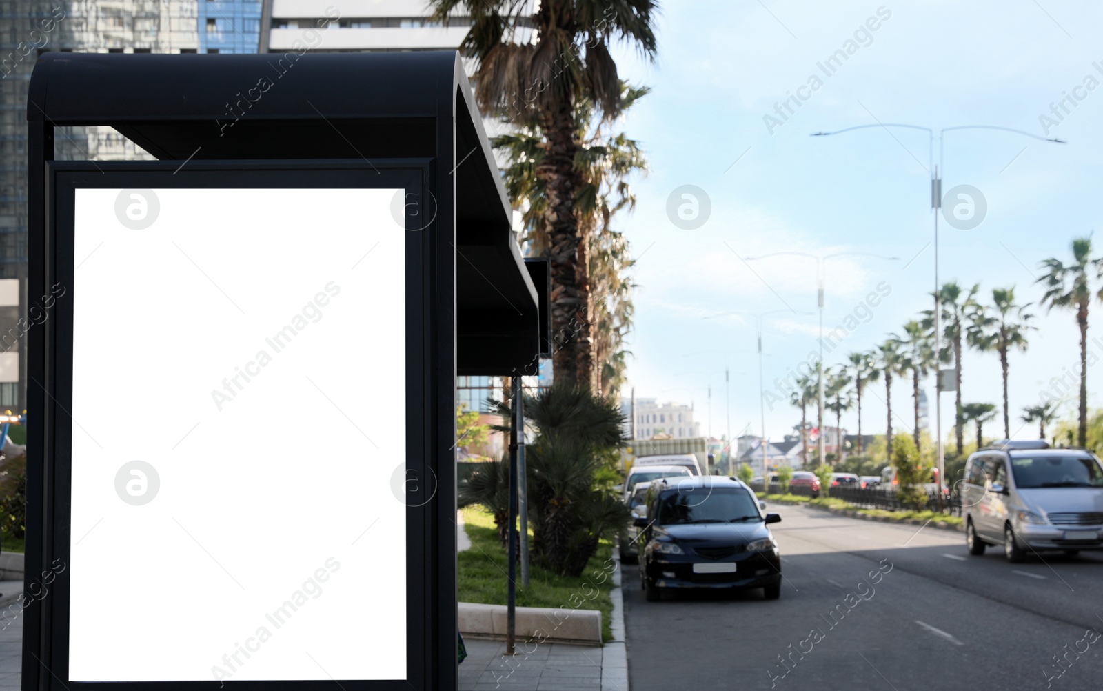 Image of Bus stop with empty signboard in city. Mock-up for design