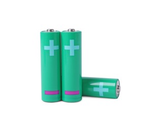 Photo of New AA size batteries isolated on white
