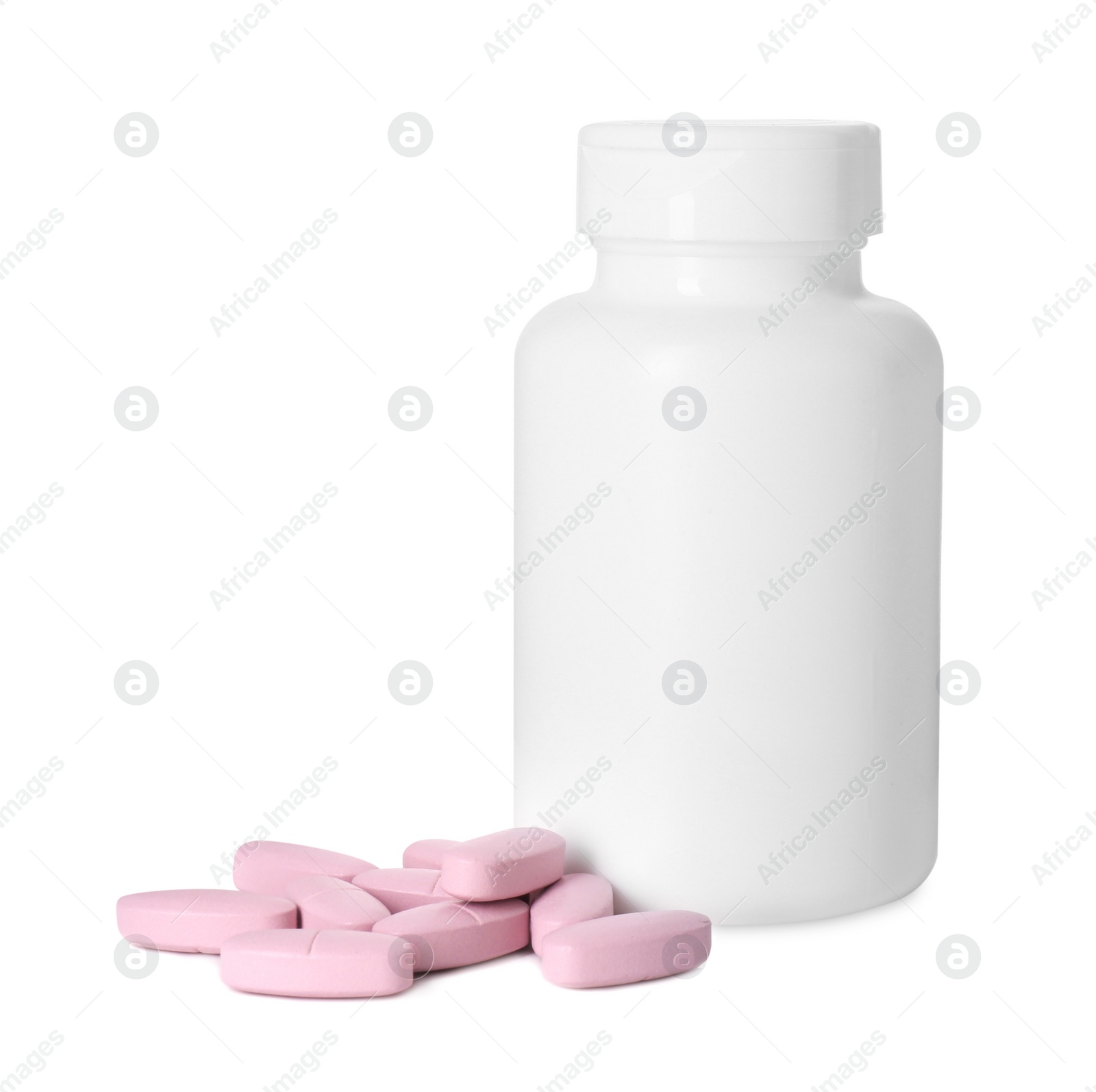 Photo of Bottle and pile of vitamin pills isolated on white