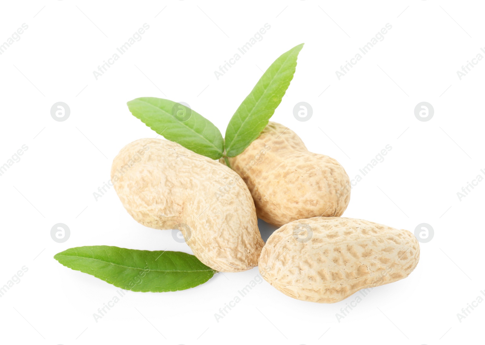 Photo of Fresh unpeeled peanuts and green leaves isolated on white