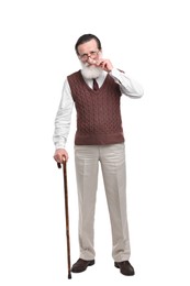 Senior man with walking cane on white background