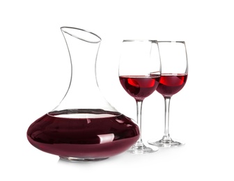 Photo of Elegant decanter and glasses with red wine on white background