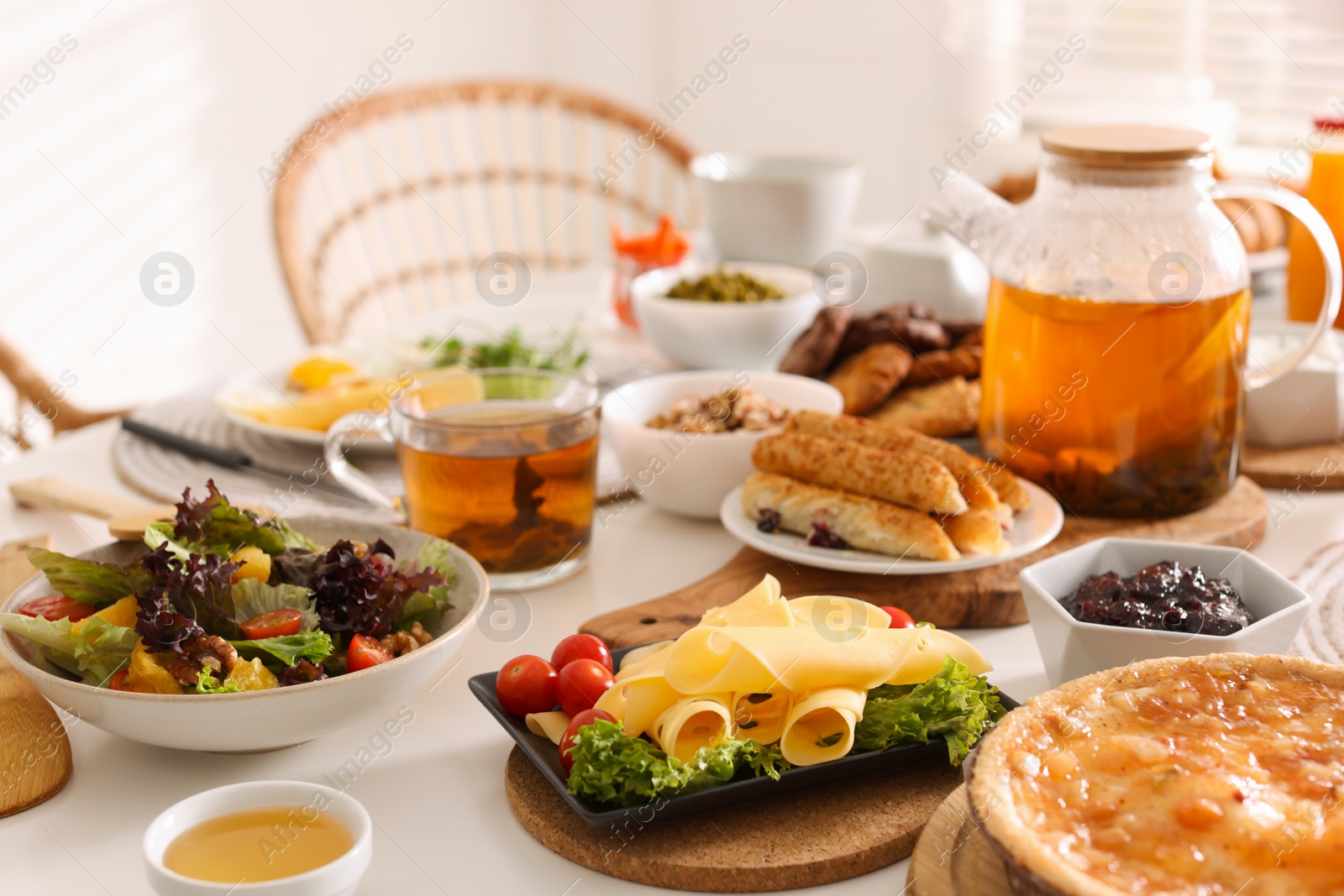 Photo of Many different dishes served on buffet table for brunch