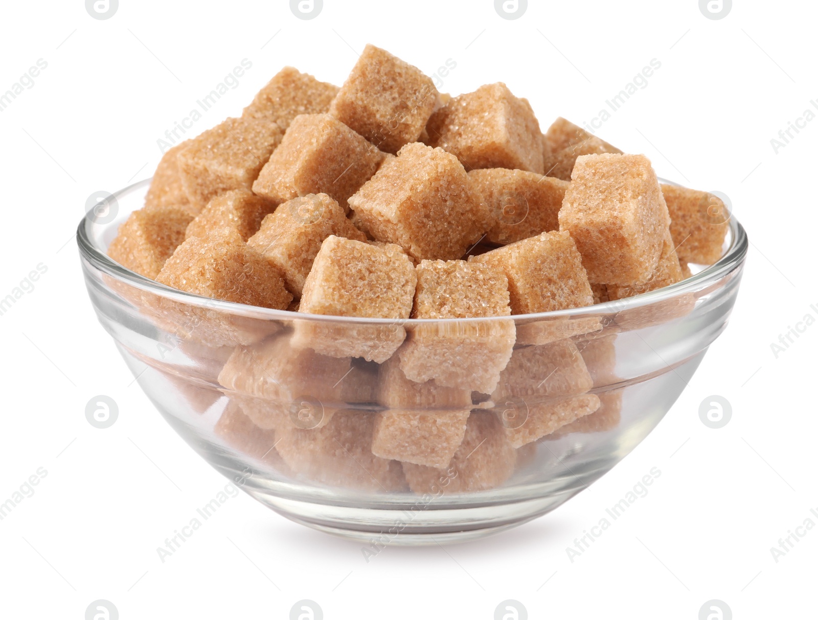 Photo of Glass bowl of brown sugar cubes isolated on white