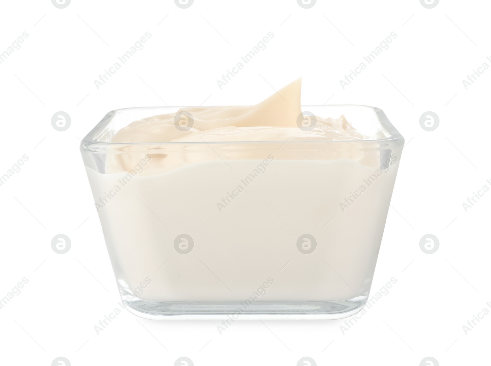 Photo of Mayonnaise in glass bowl isolated on white