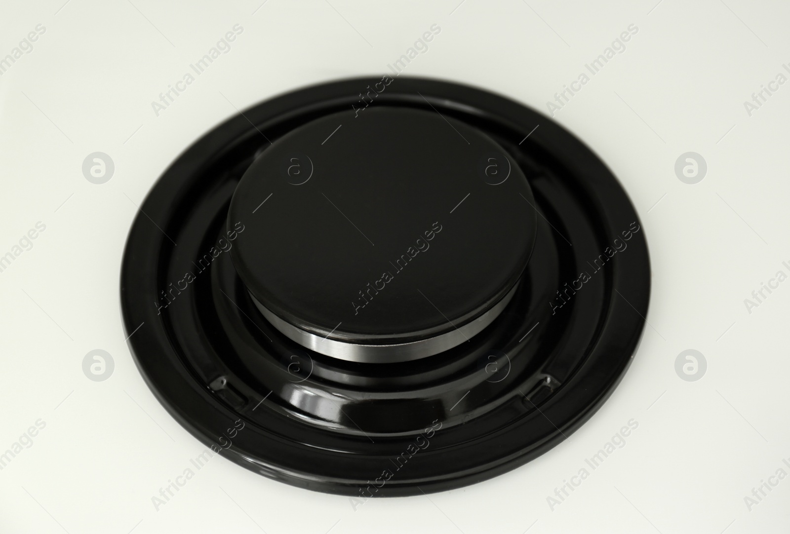 Photo of Modern built-in gas cooktop, closeup. Kitchen appliance