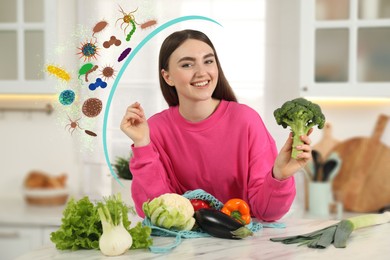 Image of Happy woman with different food products in kitchen. Healthy diet - strong immunity