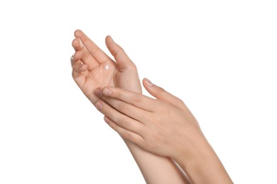 Photo of Woman applying cream on hand against white background, closeup