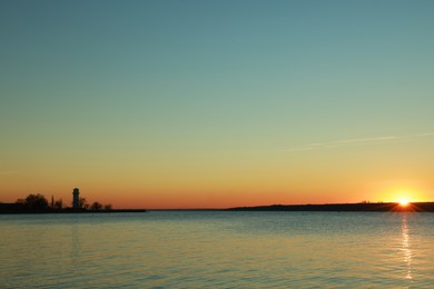 Photo of Picturesque view of beautiful sunset over calm river