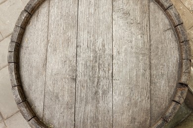 Traditional wooden barrel outdoors, top view. Wine making