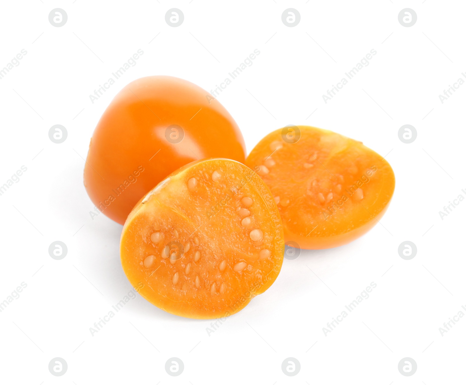 Photo of Cut and whole ripe physalis fruits on white background
