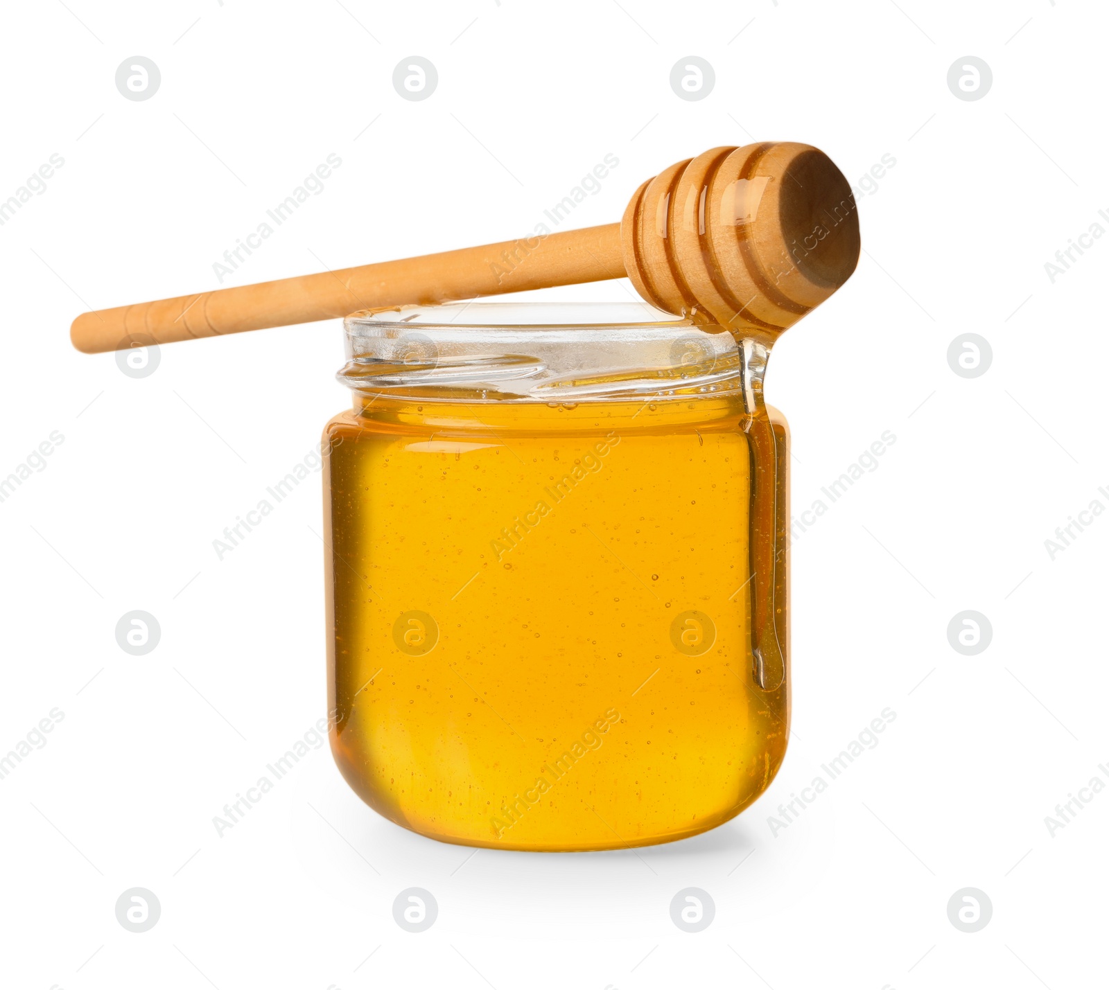 Photo of Tasty honey in glass jar and dipper isolated on white