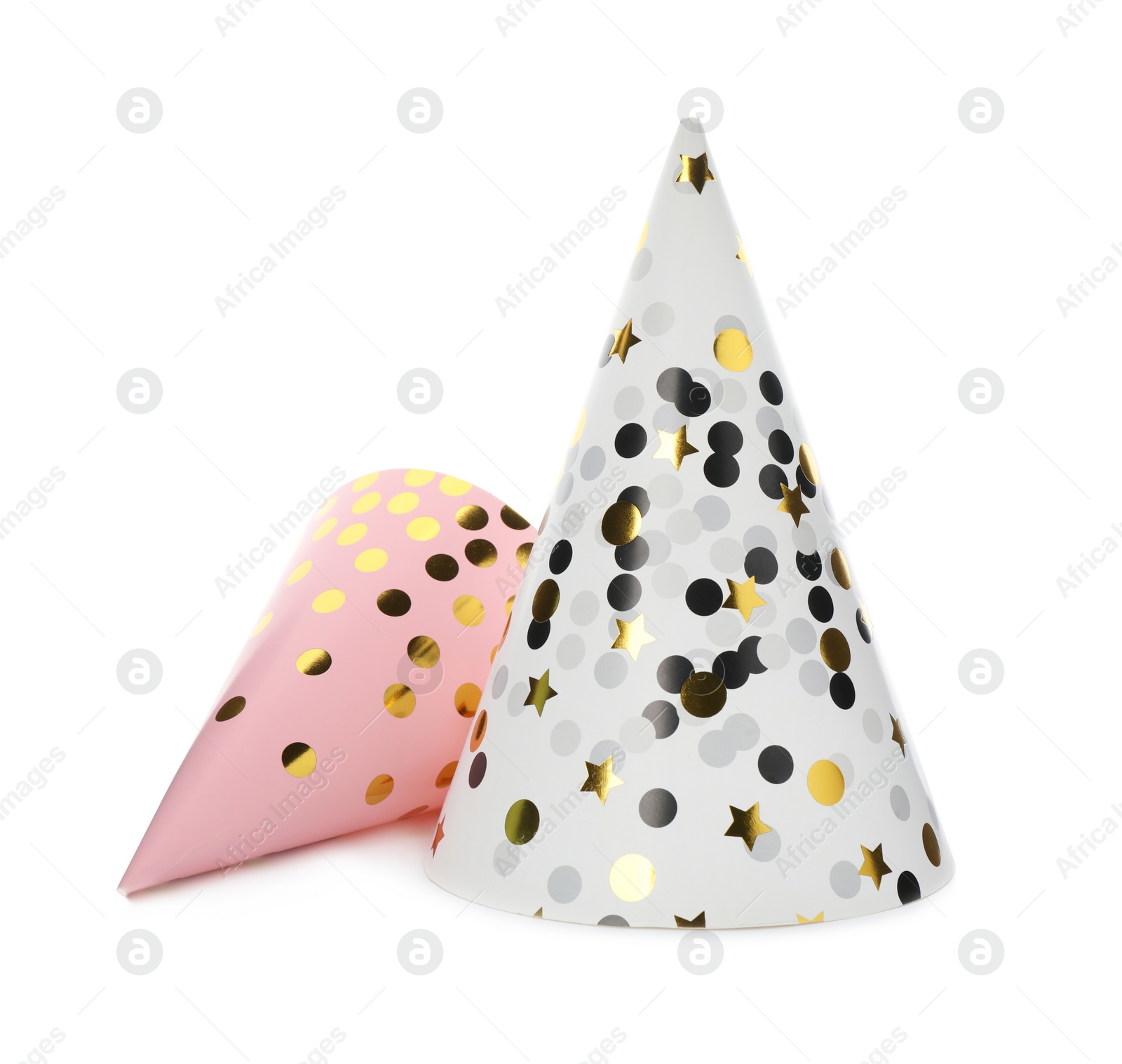 Photo of Bright party hats on white background. Festive accessory