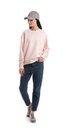 Photo of Full length portrait of young woman in sweater isolated on white. Mock up for design