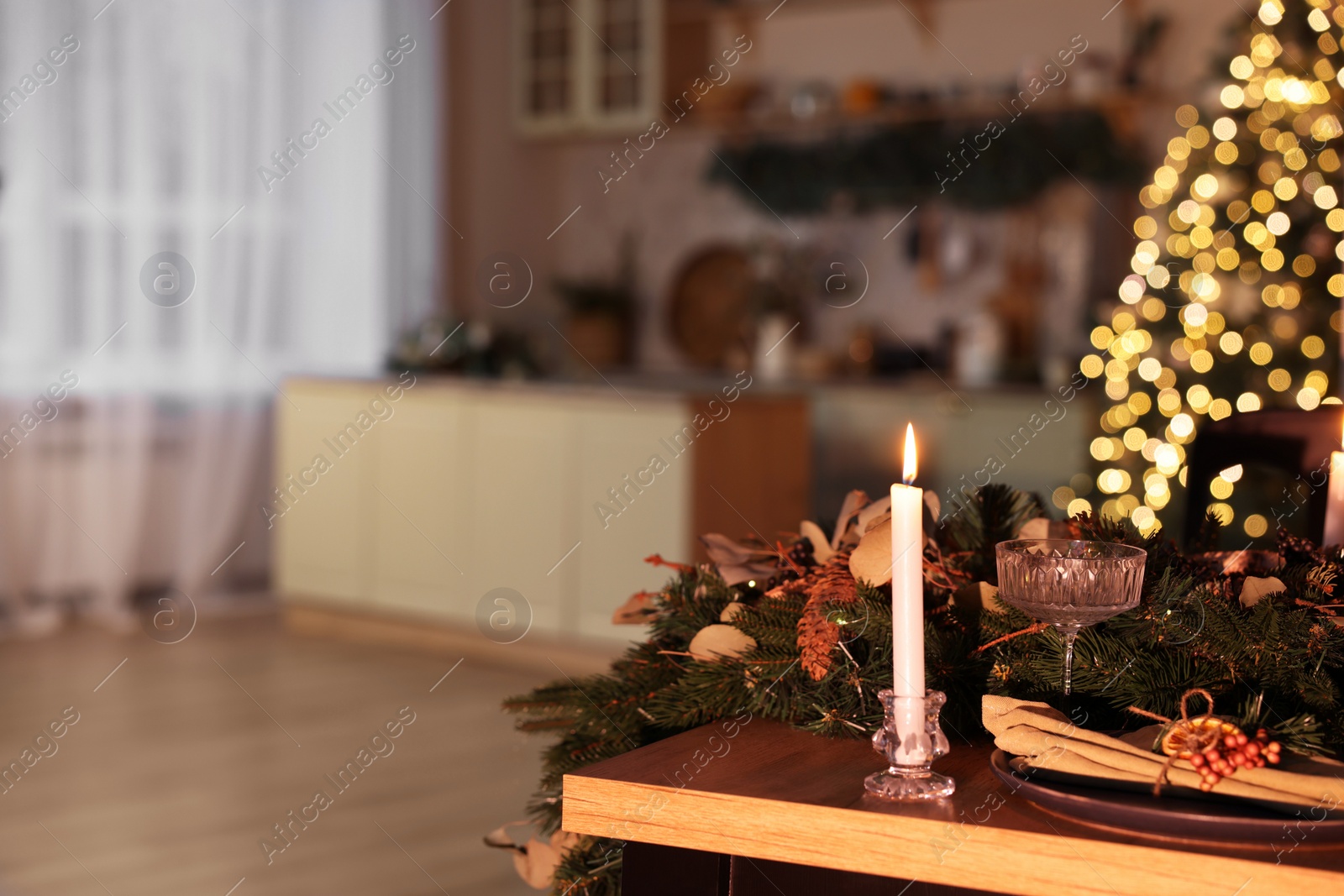 Photo of Stylish room with burning candle, Christmas tree and festive decor, space for text. Interior design