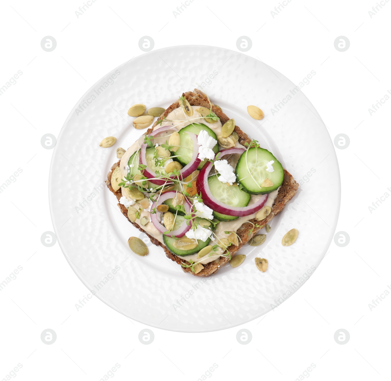 Photo of Tasty vegan sandwich with cucumber, onion, hummus and pumpkin seeds isolated on white, top view