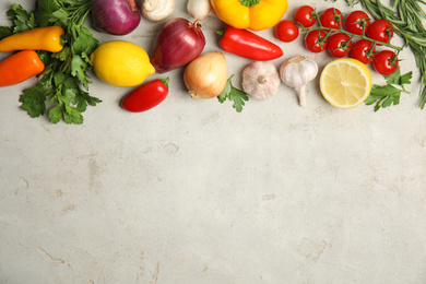 Photo of Flat lay composition with ingredients for cooking on light table. Space for text