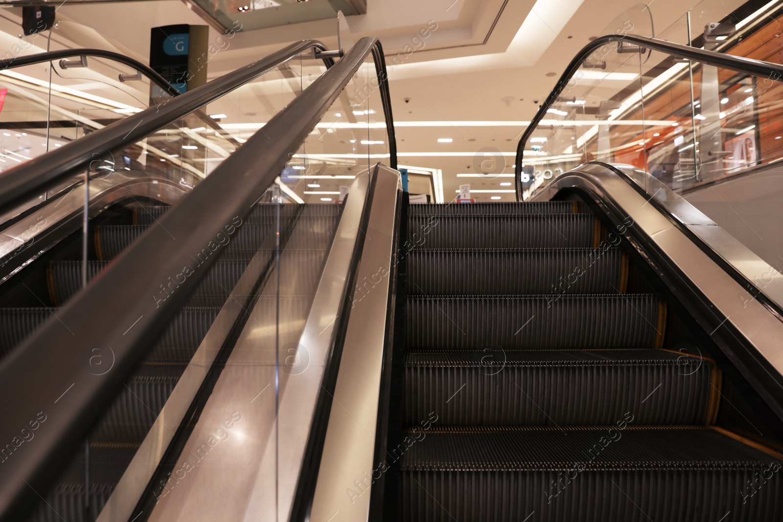 Photo of DUBAI, UNITED ARAB EMIRATES - NOVEMBER 03, 2018: Modern escalators in shopping mall