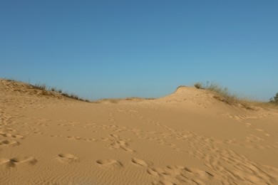 Picturesque view of desert on sunny day